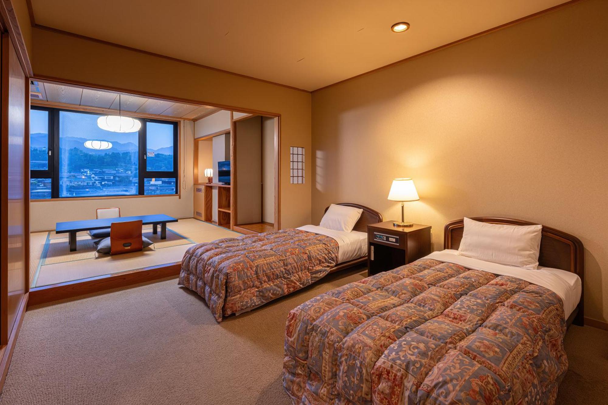 Mikuma Hotel Hita Luaran gambar